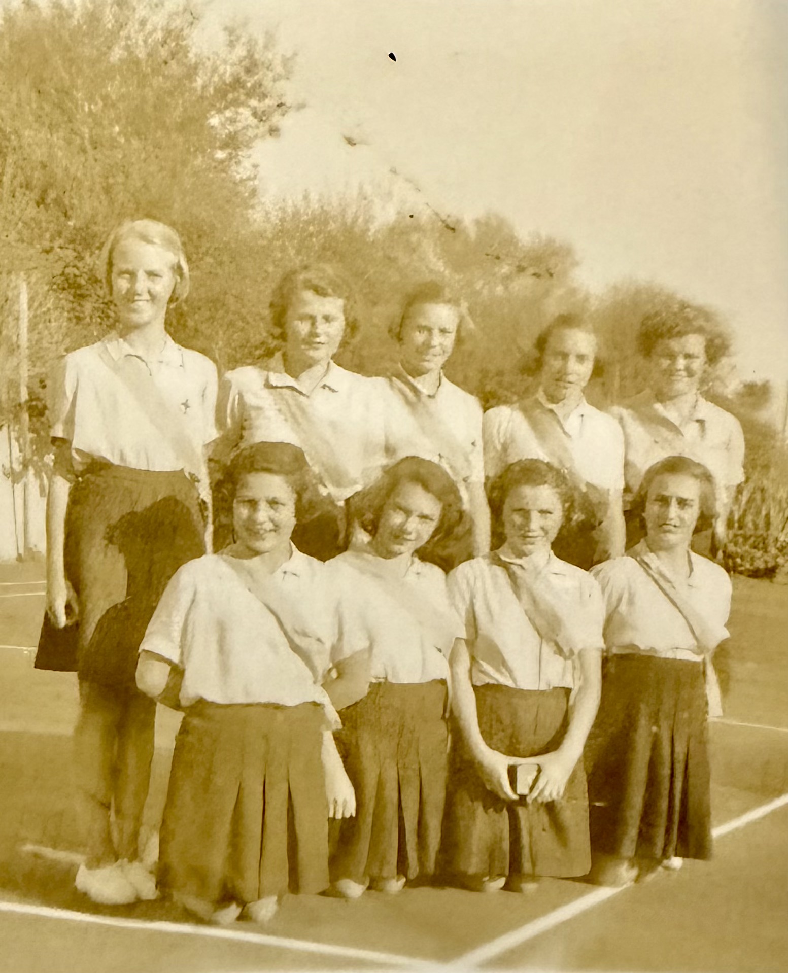 Tennis team — Shell front, 2nd from left, 1944